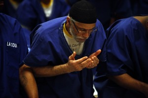 Muslim inmates in the Jumu'ah prayer service in the chapel of the Men's Central Jail in Los Angeles County during the month of Ramadan. (Genaro Molina/Los Angeles Times) 