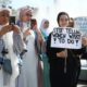 A group gathered in front of the French Embassy protests against the ban on abaya (long dress) in schools in France in Vienna, Austria on September 16, 2023